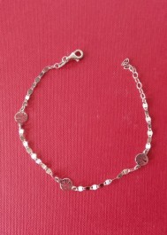 Silver bracelet with a tree-shaped pendant